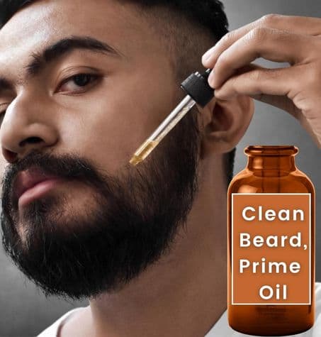 Clean, well-groomed beard next to a bottle of beard oil, with the label Clean Beard, Prime Oil (1)