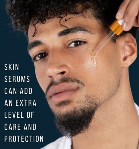 a man applying a skin serumto his face