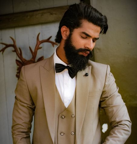 elegant bearded man with signature look