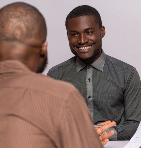 happy bearded man during interview