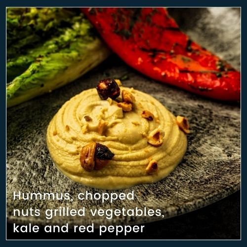 hummus with nuts grilled vegetables kale and red pepper