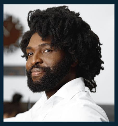 man with well-groomed thick coily hair