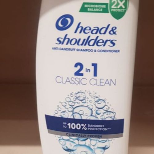 bottle of head and shoulders on supermarket shelf
