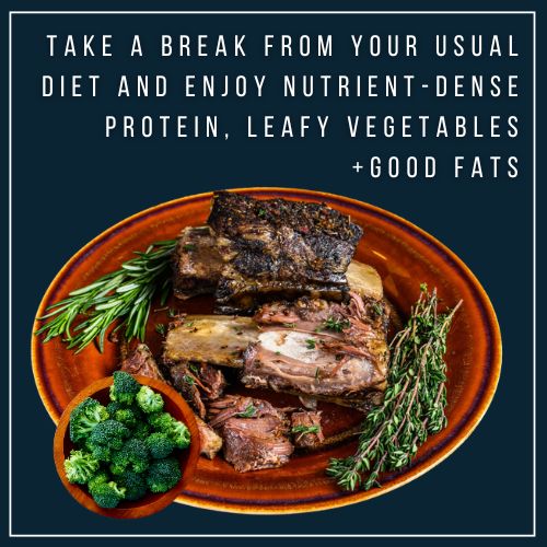 a plate full of green grilled short ribs and rosemary with a side dish of steamed broccoli.Text overlay says Take a break from your usual way of eating and enjoy Nutrient-dense, protein, green leafy vegetables and good fats
