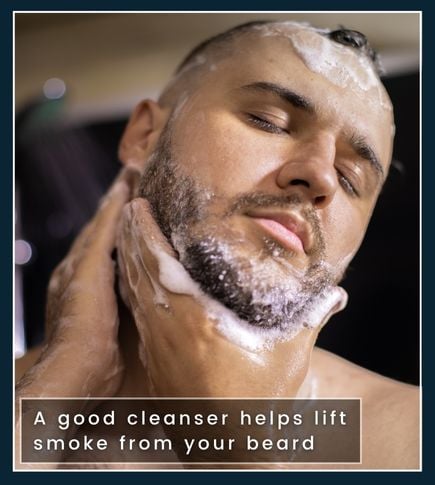 Beard wash being massaged into the beard to clear smoke buildup and residue