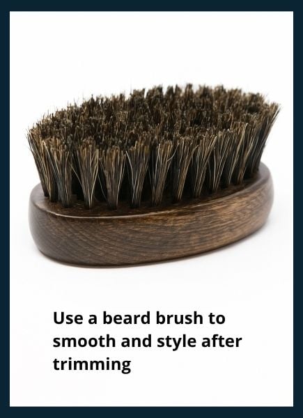 Close‑up of a boar‑bristle brush fo smoothing a freshly trimmed beard