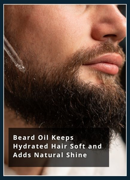 Man in a white towel smoothing oil into his medium‑length beard, which looks soft with a natural shine but not greasy