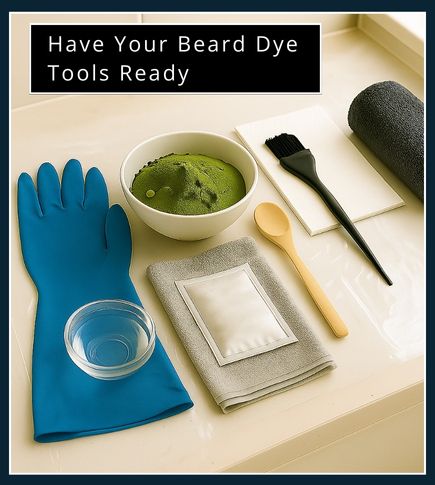 Bathroom counter with bowl of henna powder, gloves, brush, and tools laid out for beard dyeing.