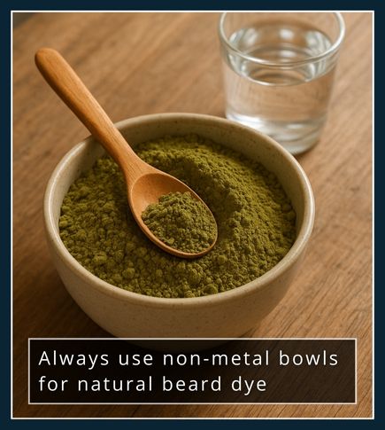 A ceramic bowl with henna powder and a wooden spoon, with a glass of water beside it, showing safe mixing without metal.