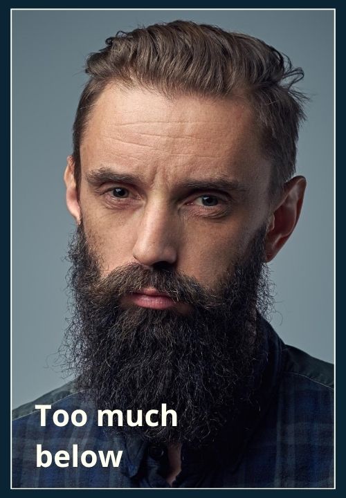A guy with noticeable thinning on top and a longer beard (a bit too long / full)