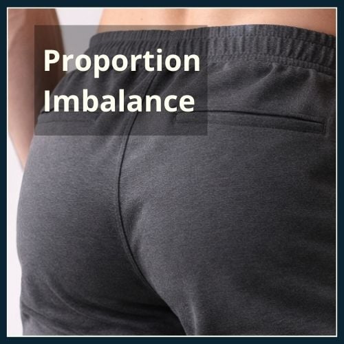 close of shot of man with large glutes wearing joggers