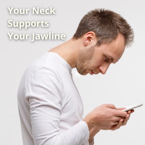 man leaning forward to read his phone, while his head is hanging forward instead of sitting stacked above his shoulders.