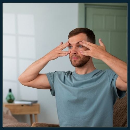 a man performing natural face lift routine