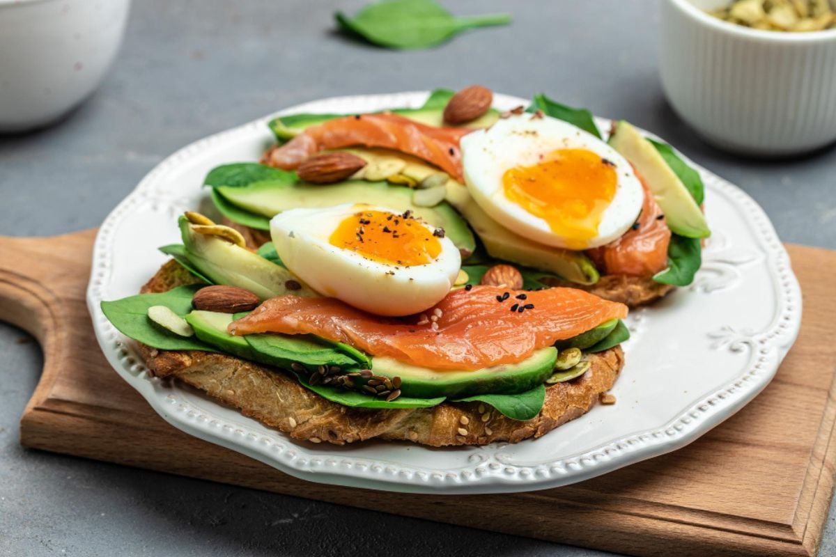 smoked salmon, avocado, eggs, spinach, proper bread, almonds, pumpkin seeds black sesame already on top