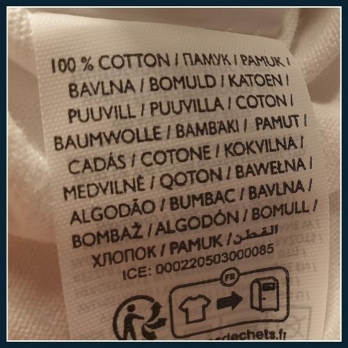 100% cotton T-shirt care label with fabric composition information